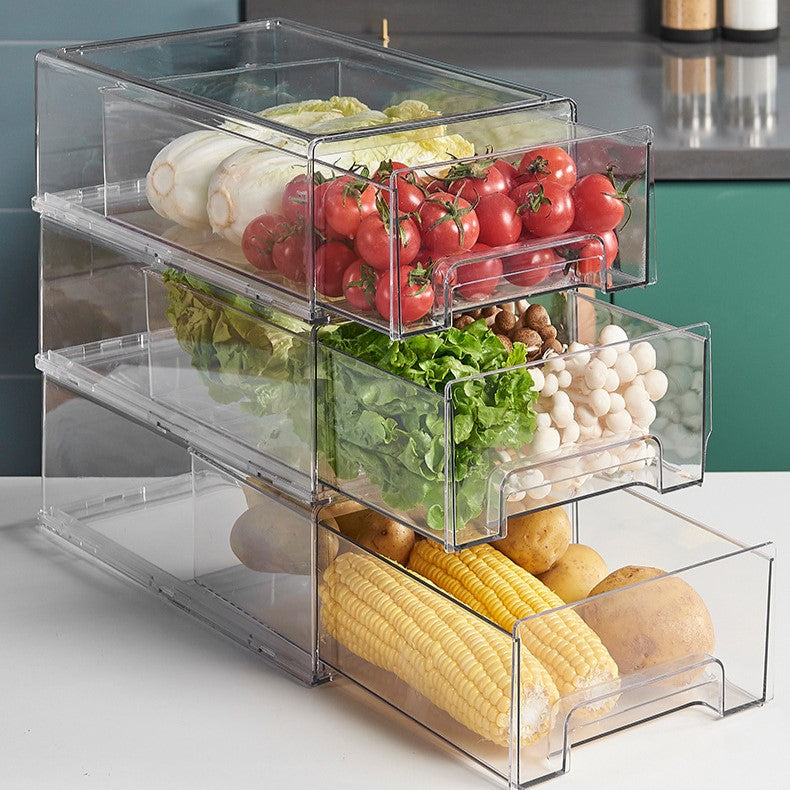 A transparent plastic drawer for fruits and vegetables, designed for refrigerator storage