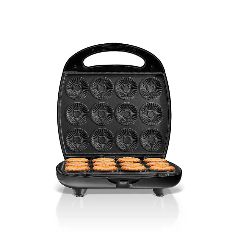 A Saachi electric Biscuit maker with twelve circular molds, shown open with freshly baked Biscuit inside, placed on a white surface.