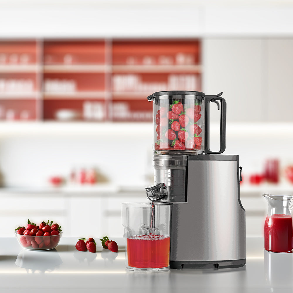 Saachi Slow Juicer NL-JU-4075 with strawberries inside feed chute, fresh juice being extracted into glass below.