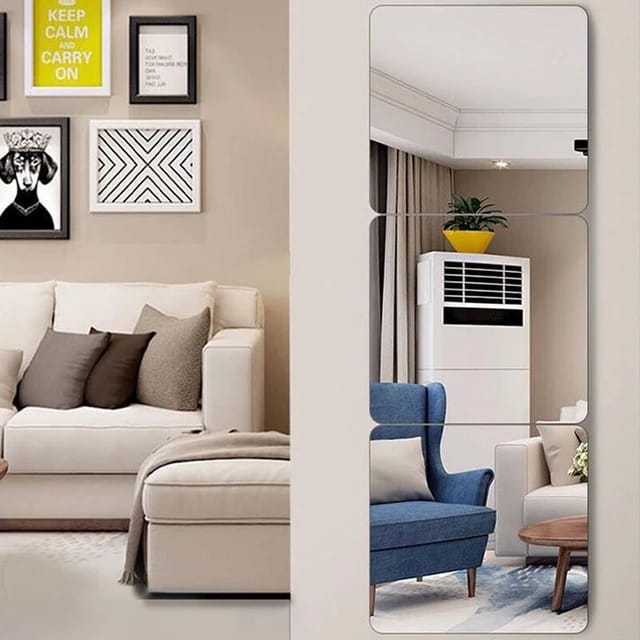 HD Self-Adhesive Acrylic Mirror elegantly placed on the wall next to a sofa
