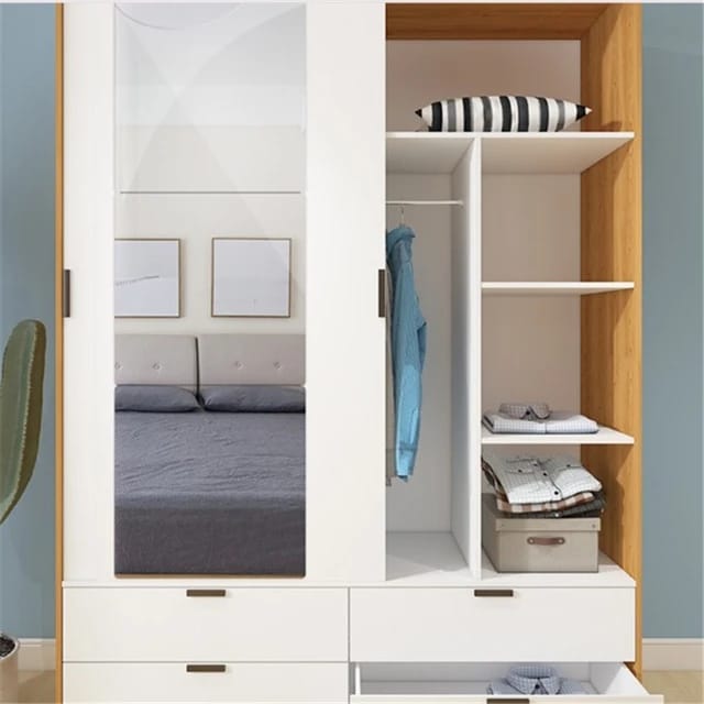 HD Self-Adhesive Acrylic Mirror Tiles placed on a wall next to a shelf with dresses