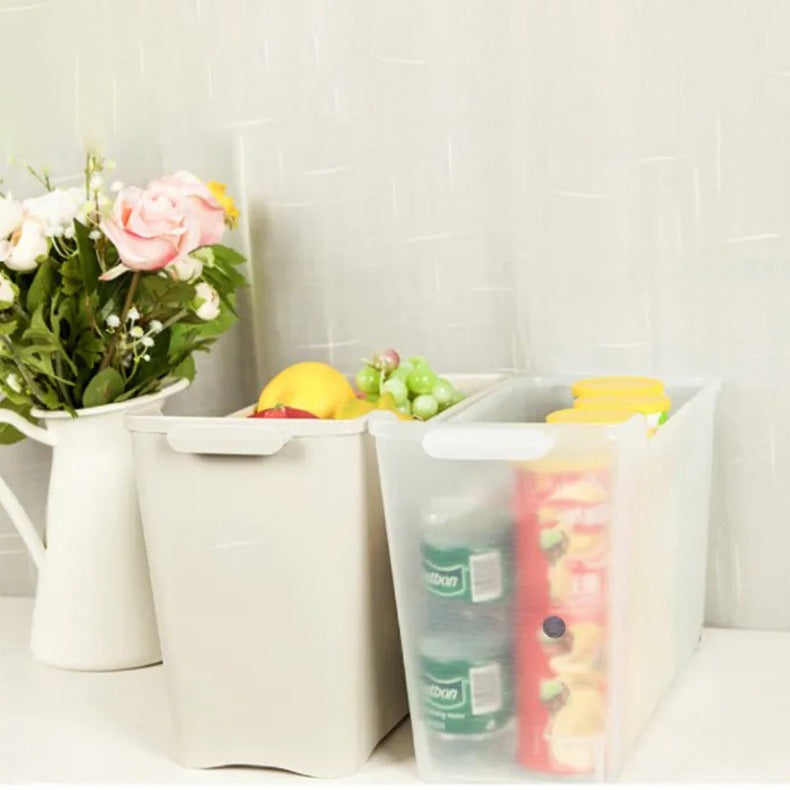 Space-Saving Narrow Gap Long Storage Box with Wheels placed on the floor next to a vase