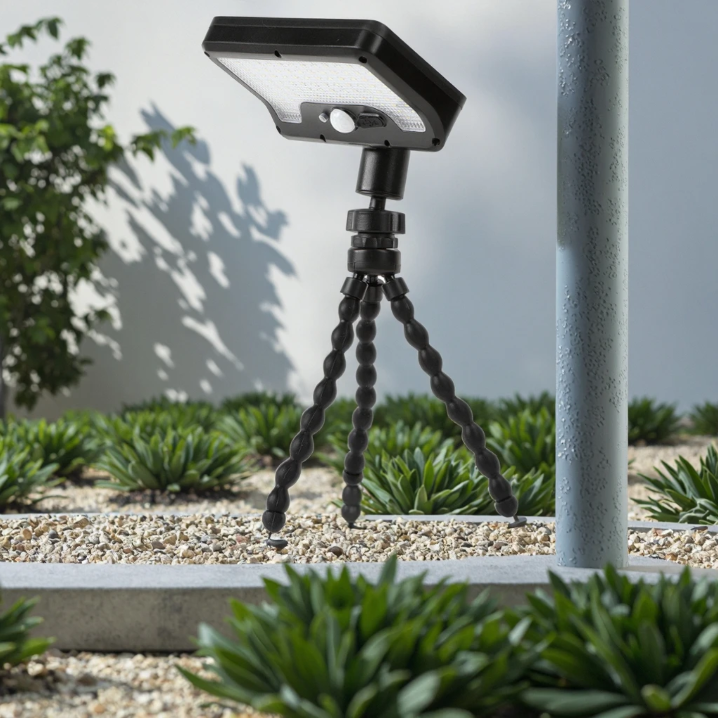 A Solar Motion Sensor Light attached to Tripod Stand.