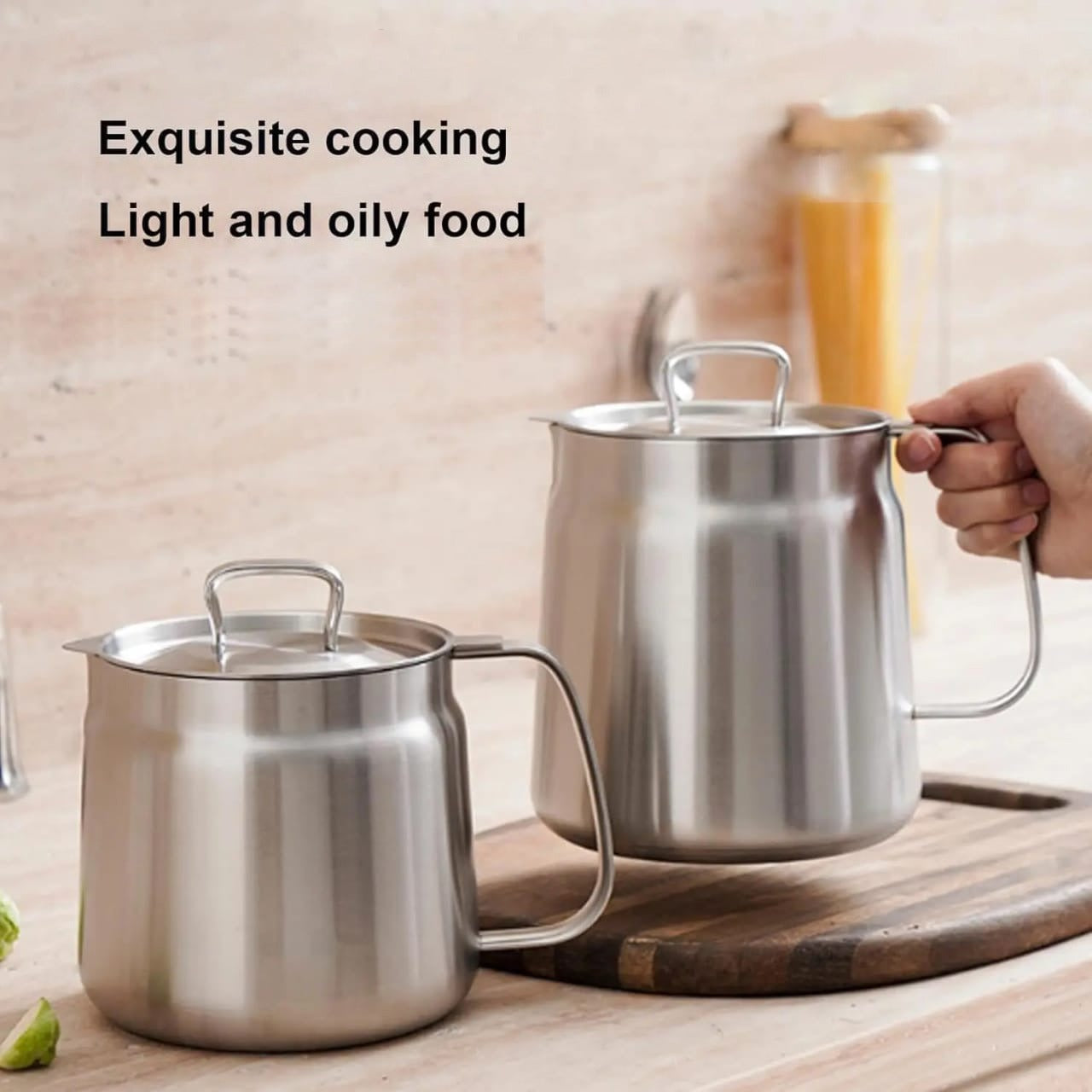 A Person is Holding Stainless Steel Oil Strainer Storage Pot.