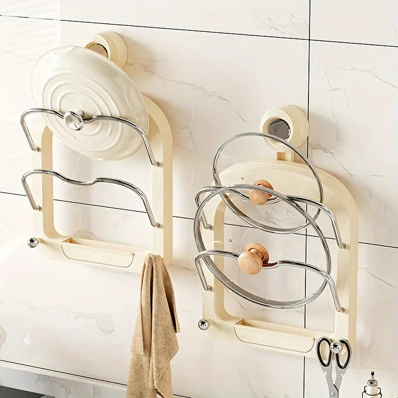 Two Suction Cup Pot Lid Holder With Lids Attached on the Wall.