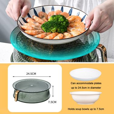 A person neatly arranges a stack of dishes on a counter, utilizing a space-saving storage rack