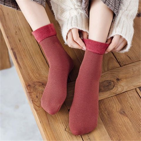 Someone wearing 1 Pair of Thick Winter Socks