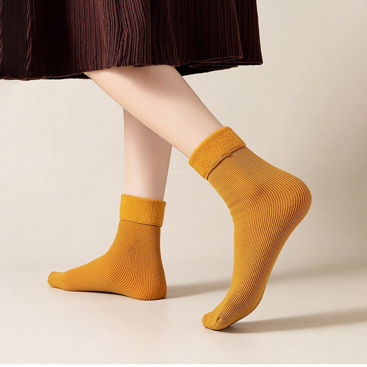 A girl wearing 1 Pair of Thick Winter Socks