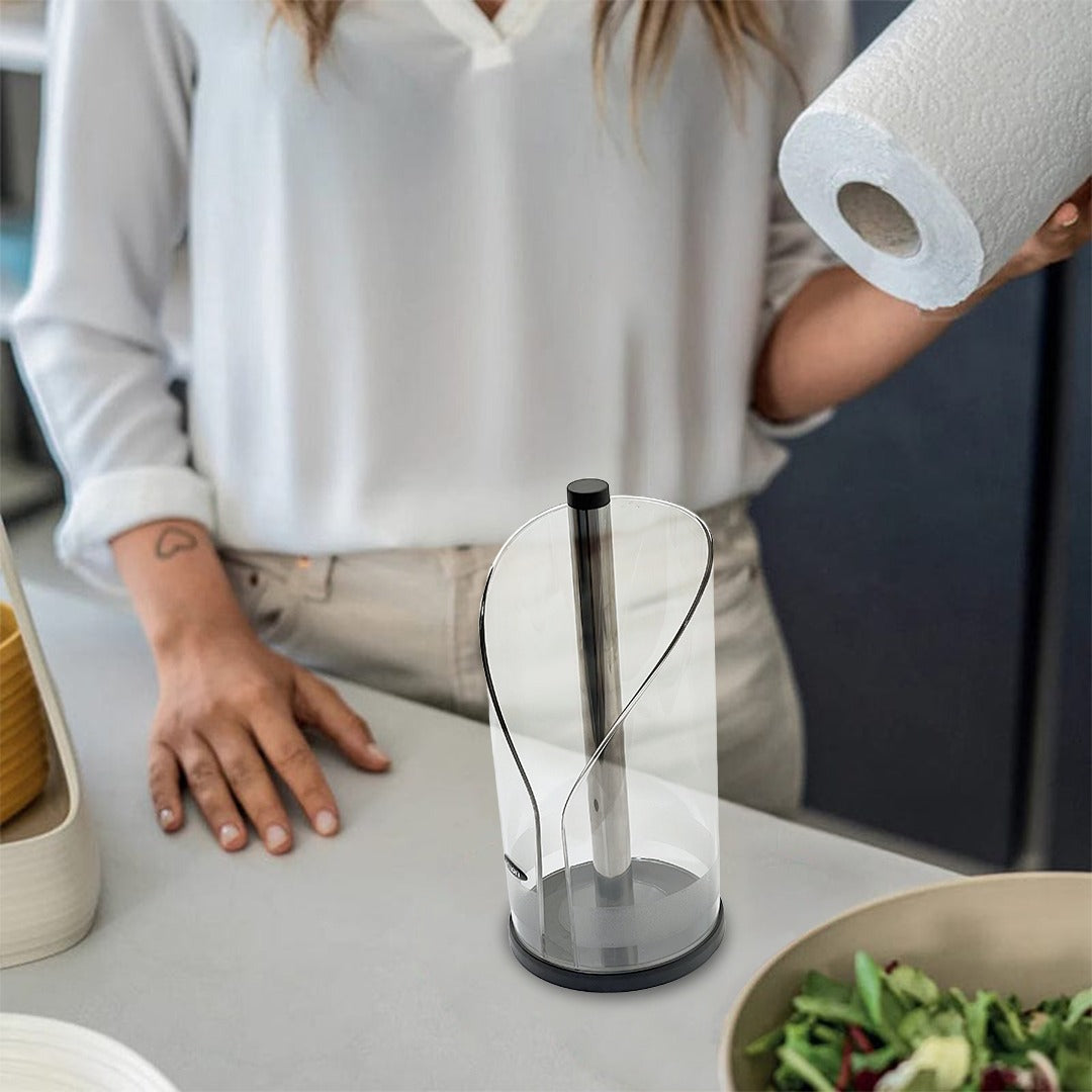 A Woman is Fixing Tissues in the Tissue Towel Rack.