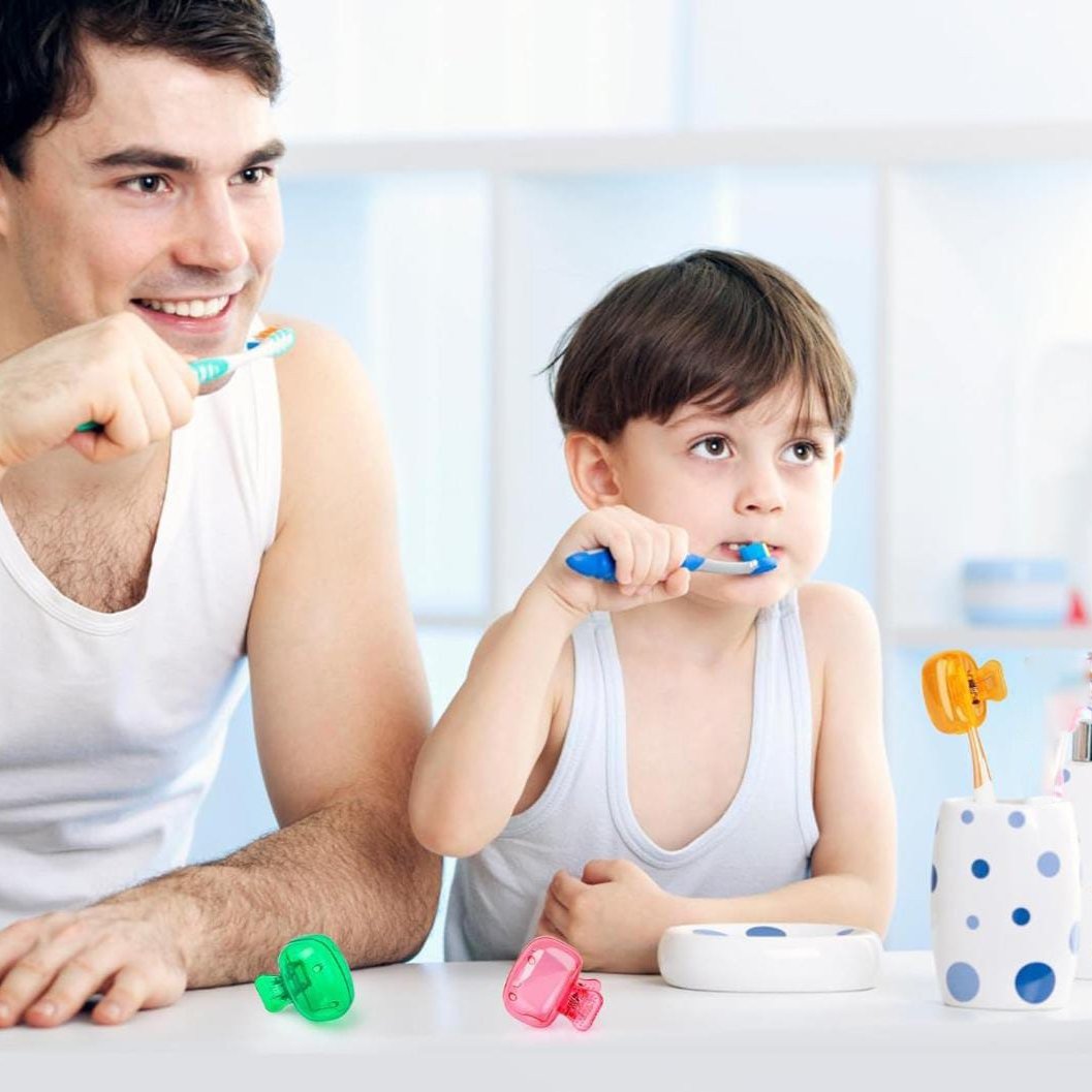 A Father and Son Uses Toothbrush Head Cover Cap to Protect Their Brush.