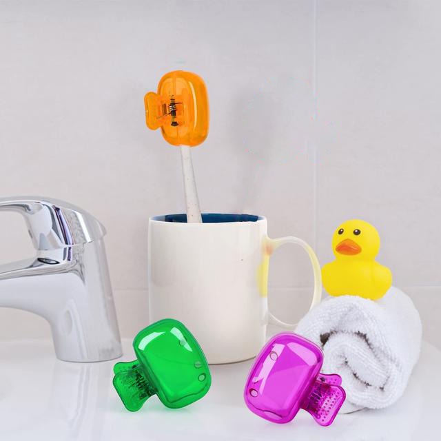 Toothbrush is Covered With Toothbrush Head Cover Cap.