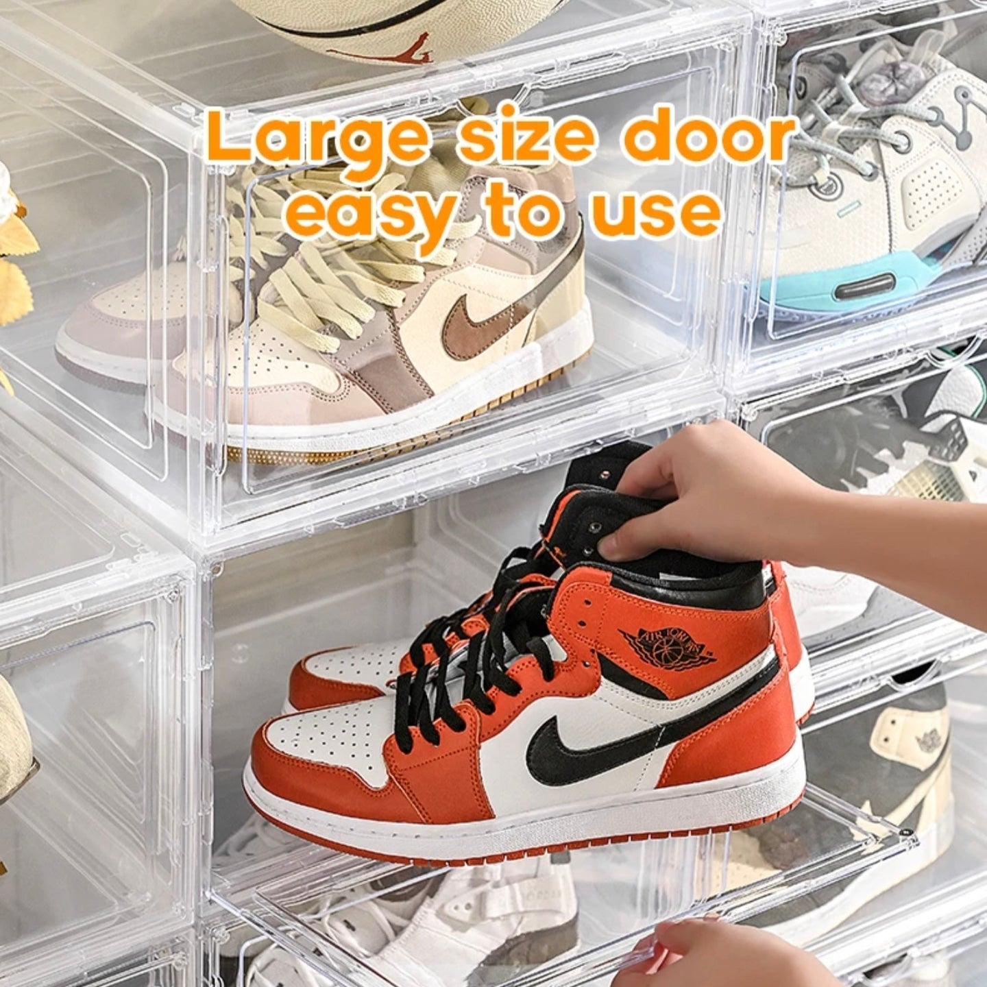 A Person is Placing Shoes at Stackable Transparent Shoe Box Organizer.