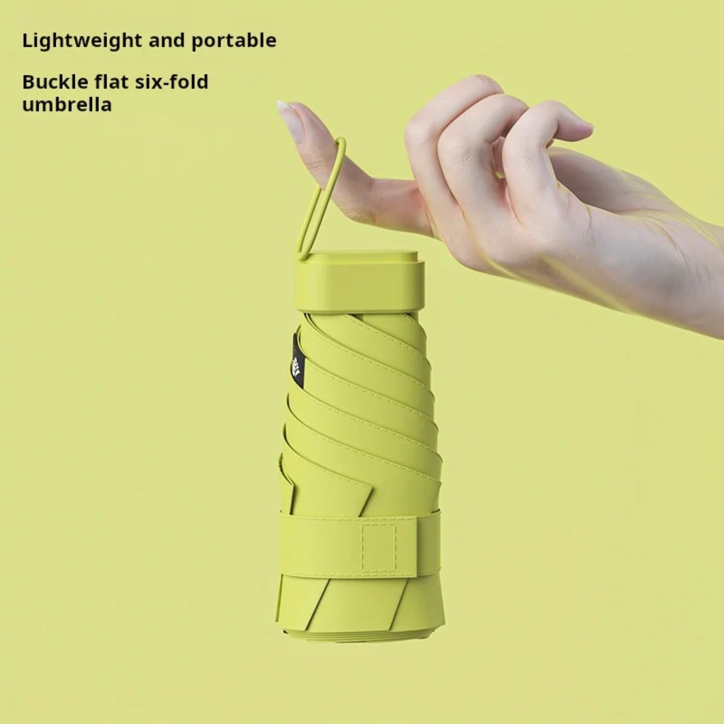 A Person is Holding Travel Mini Folding Pocket Umbrella.