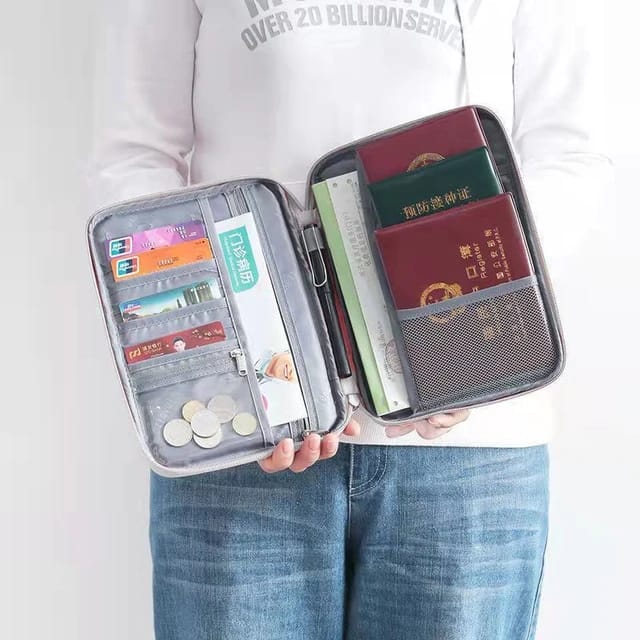 Someone holding a Travel Passport and Document Organizer Bag