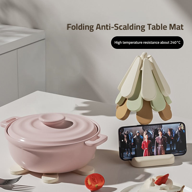 A Food Container is Placed on a Tree Coaster Set and Phone is Arranged on the Base Of Tree Coaster Set.