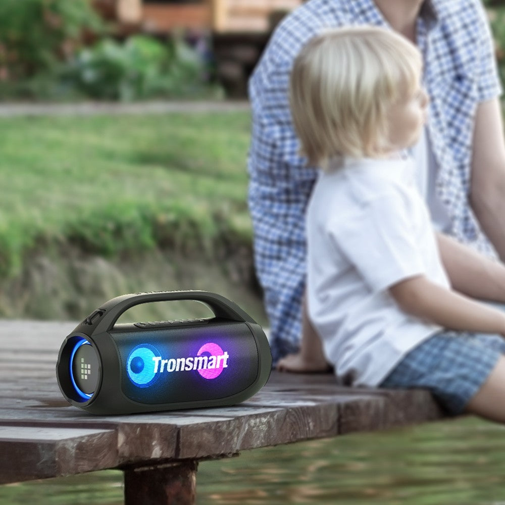 Tronsmart Bang SE Portable Party Speaker is Placed Near Dad And Son.