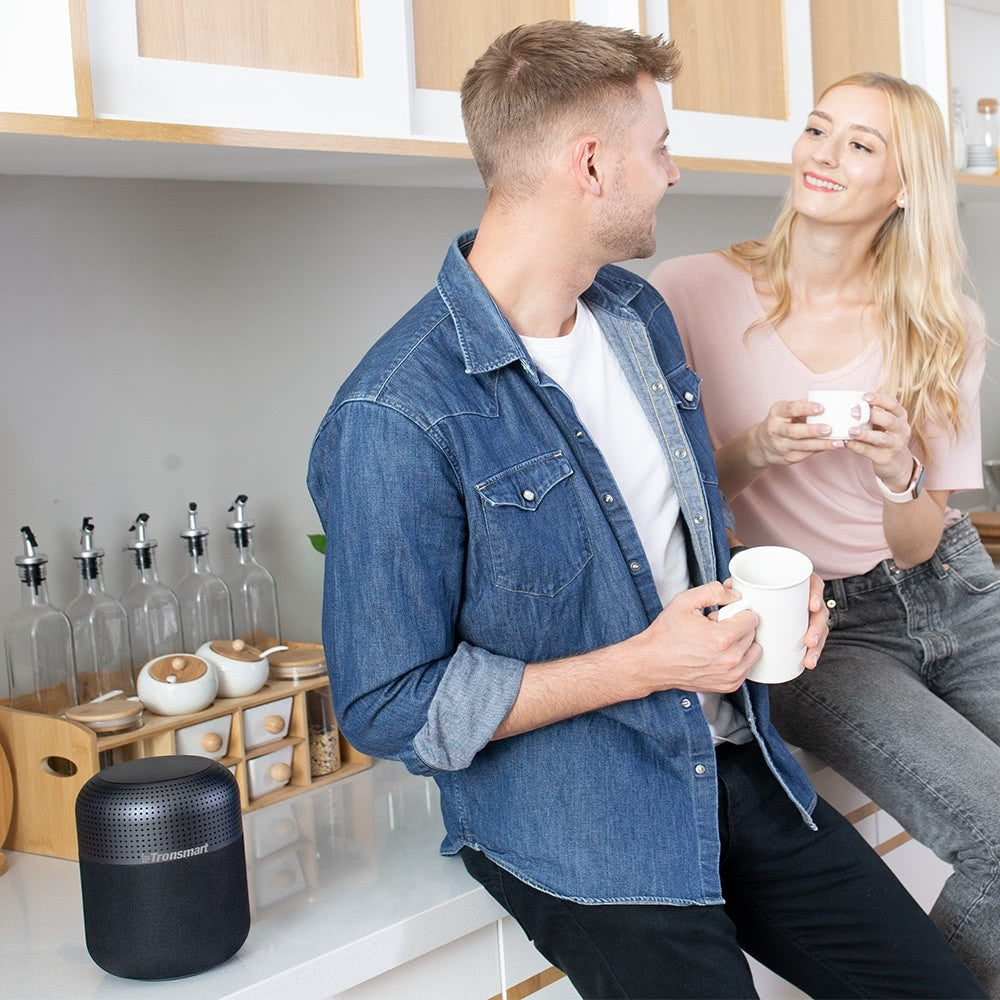 A Couple is Enjoying By Playing Tronsmart Element T6 Max Wireless Speaker.