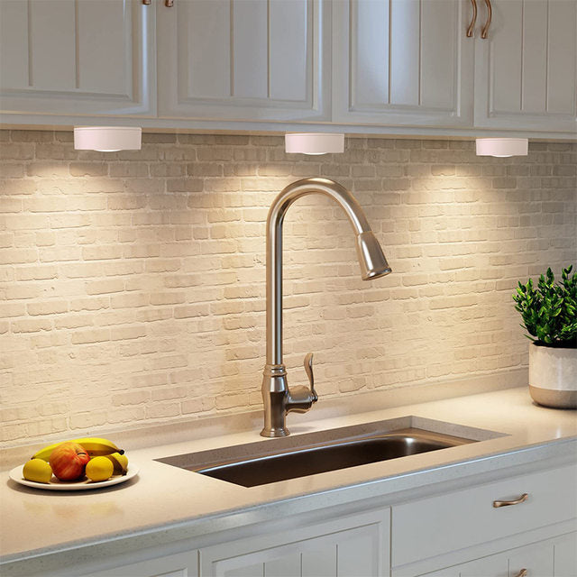 3 Pcs Dimmable LED Under Cabinet Light with Remote Control is Placed Under Kitchen Cabinet.
