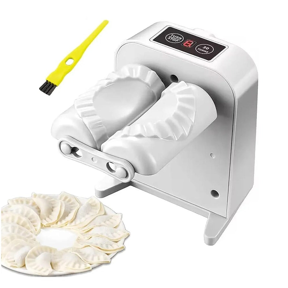USB Rechargeable Electric Dumpling Machine placed next to plates of dumplings