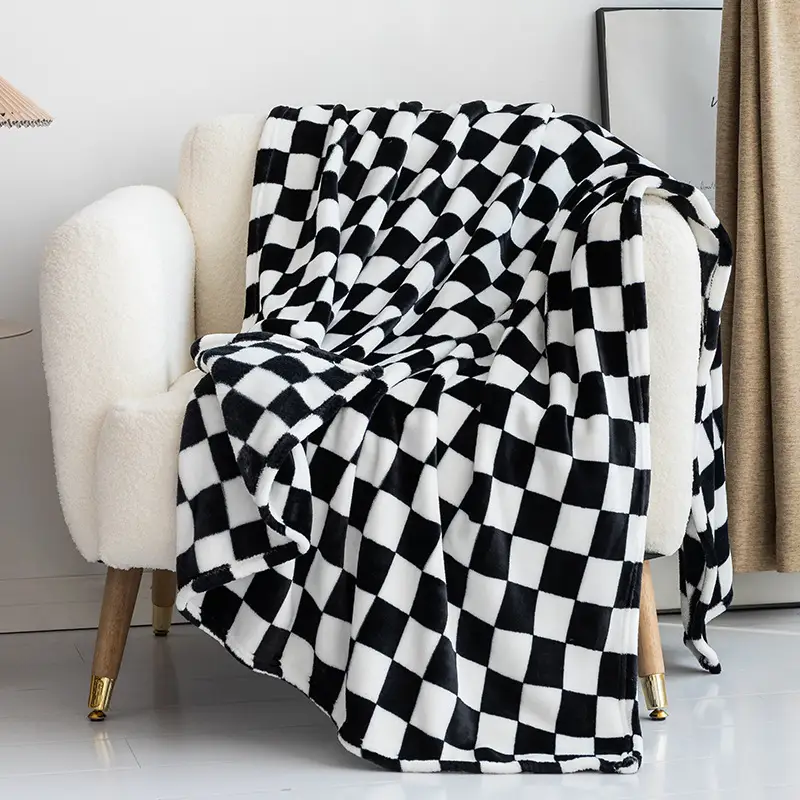Ultra Soft Flannel Fleece Blanket is Kept on a Chair.