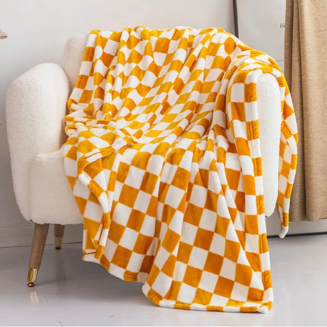 Ultra Soft Flannel Fleece Blanket is Kept On a Chair.