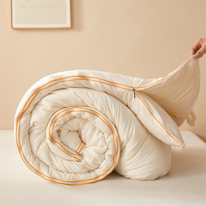 A Person is Holding Ultra Soft Soy Fiber Comforter.