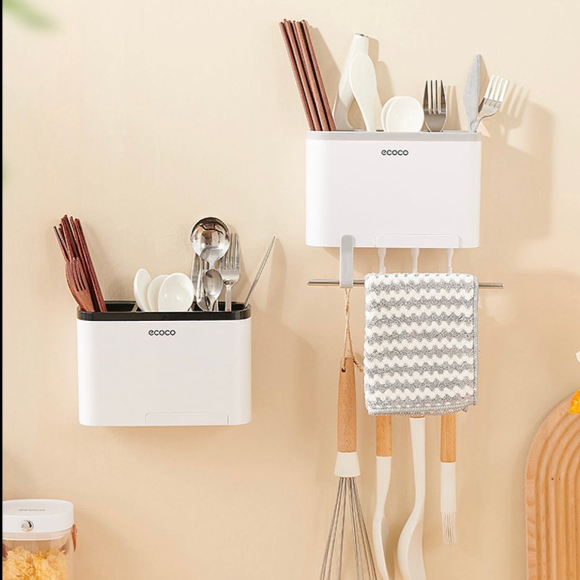 Ecoco Utensil Storage Rack placed on the wall with some items in it