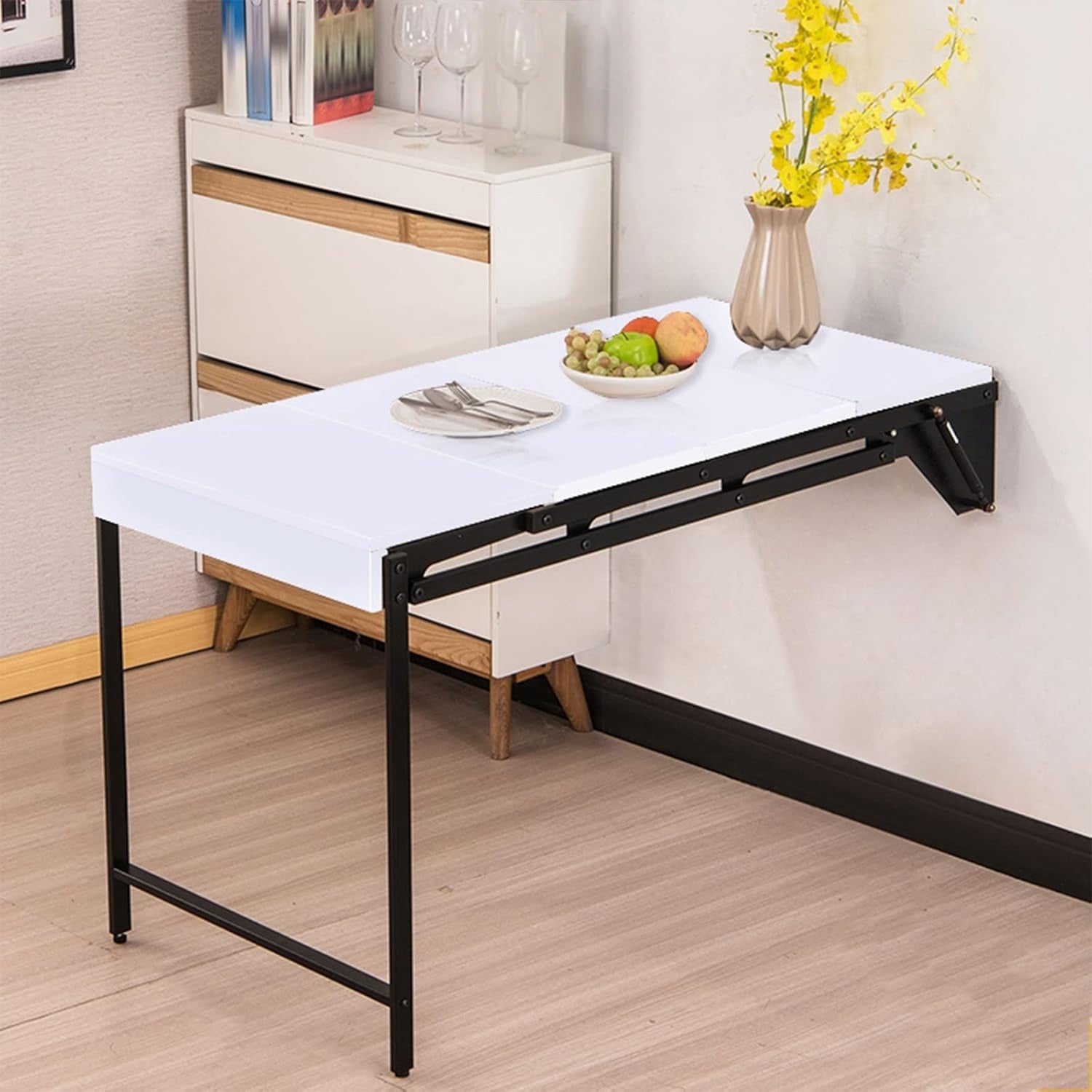 A Wall Mounted Folding Table Is Attached to the Wall Of Dining Area.