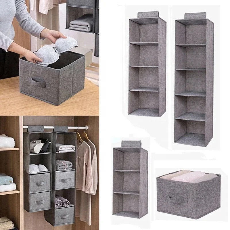 Someone is placing something into wardrobe clothes storage bags