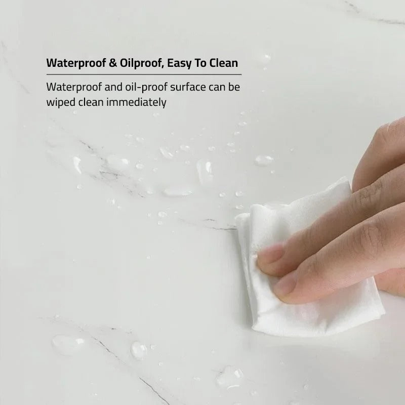 A Person is Rubbing Water On The 3D Imitation Marble Pattern Wall Sticker.