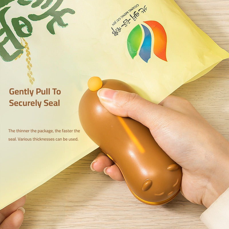 A person gently sealing a plastic bag using Snack Bag Sealer Machine