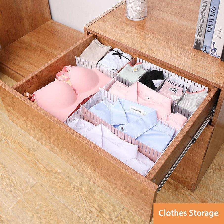 Cloths organized in a drawer with the help of Adjustable Drawer Dividers