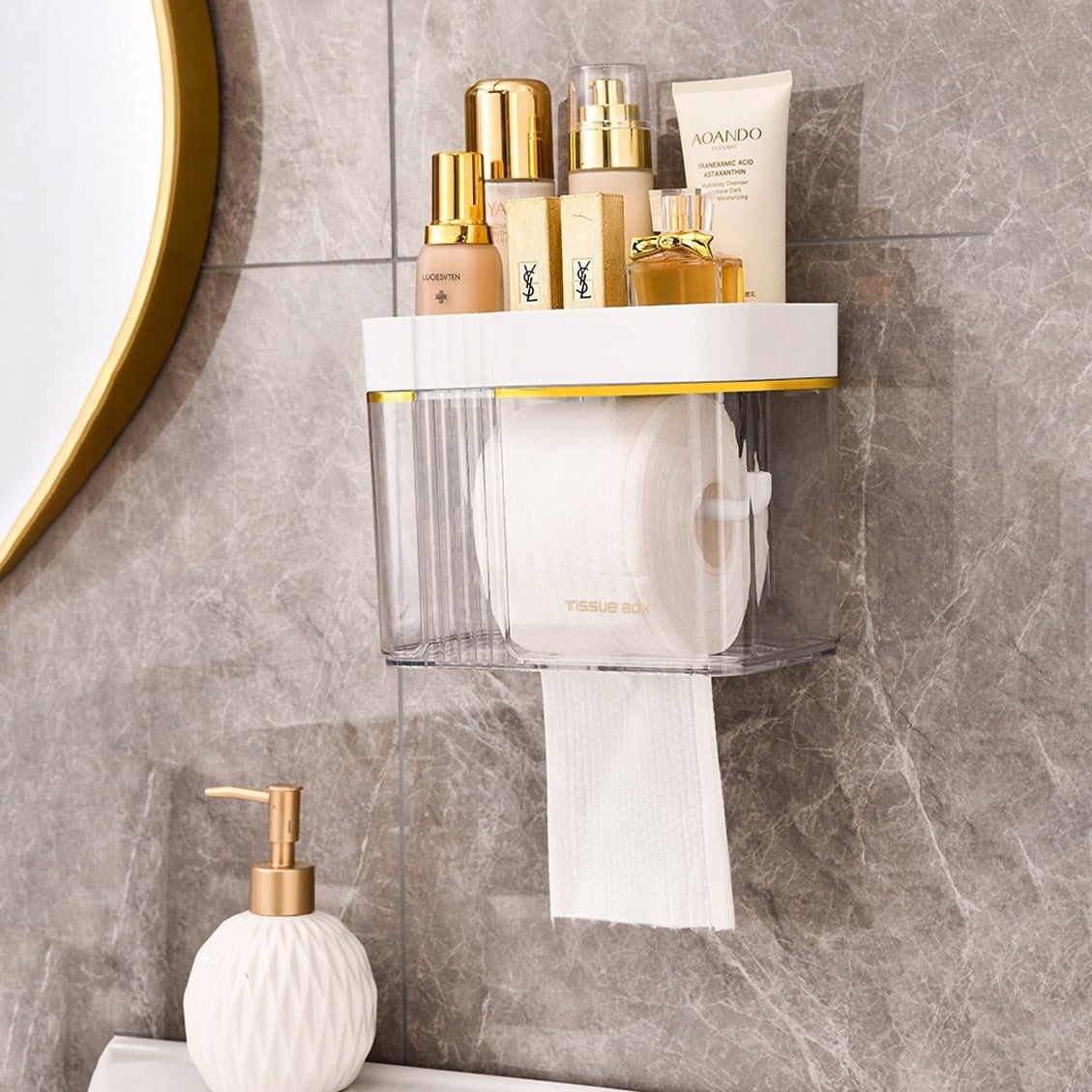 A tissue roll and cosmetic items stored in a Transparent Wall-Mounted Toilet Paper Holder with Storage Shelf next to a handwash liquid