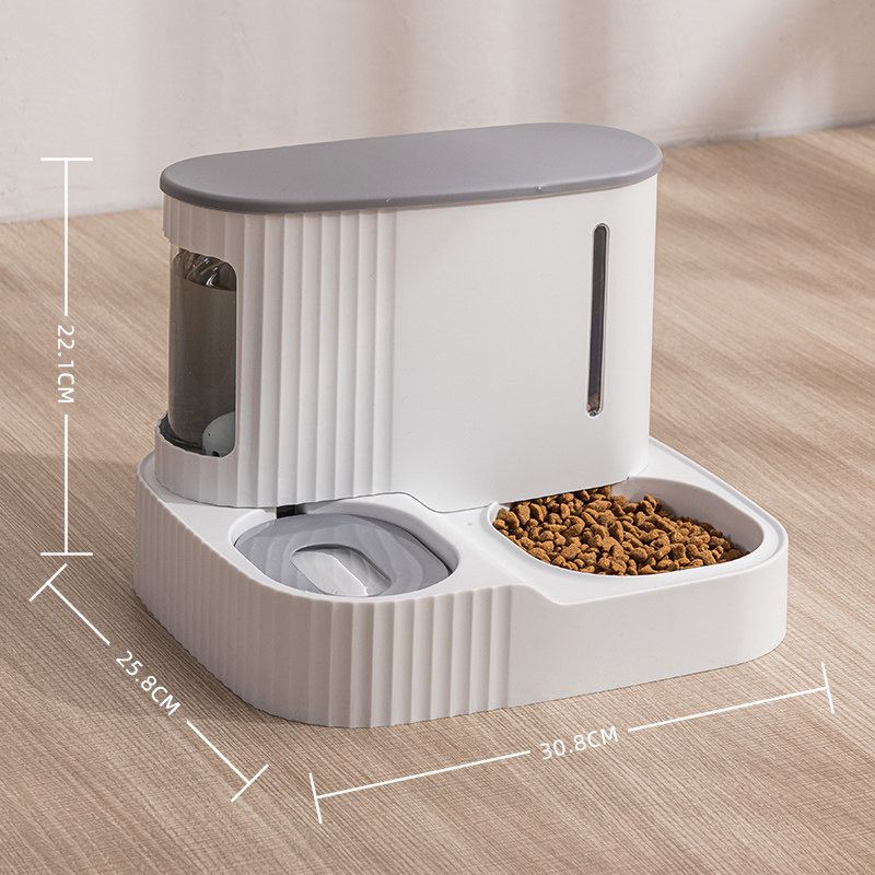 Grey color Automatic Pet Feeder & Water Dispenser placed on a wooden floor by mentioning it's size