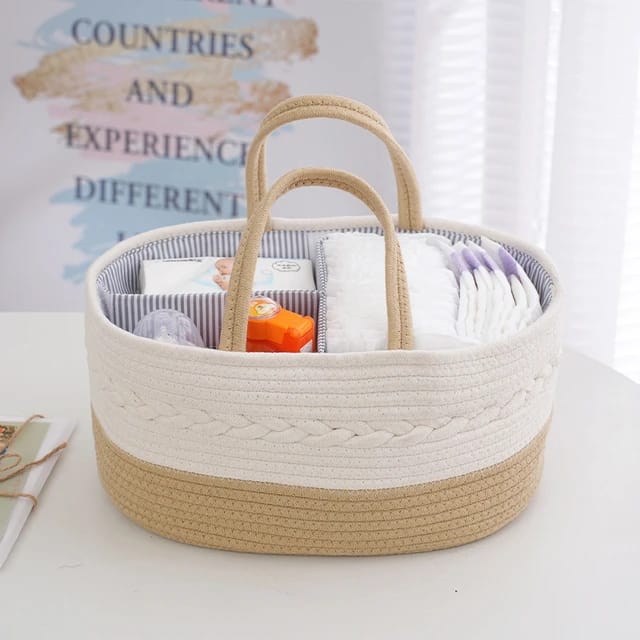 Beige color Nursery Storage Basket kept on top of a white surface