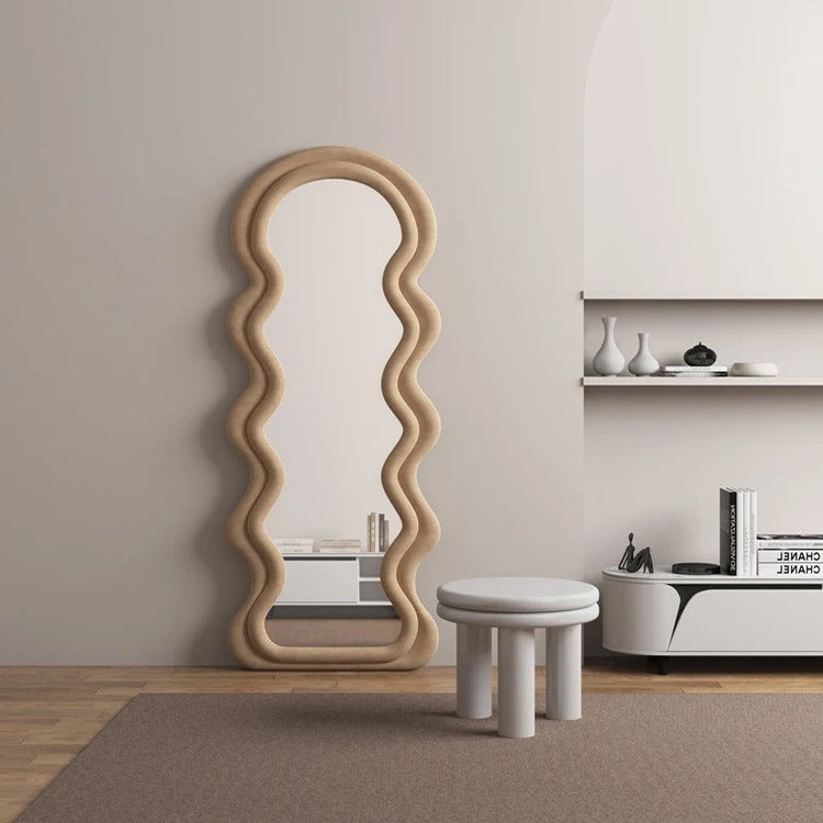 Curve shaped Full-Length Mirror placed in living room of a house