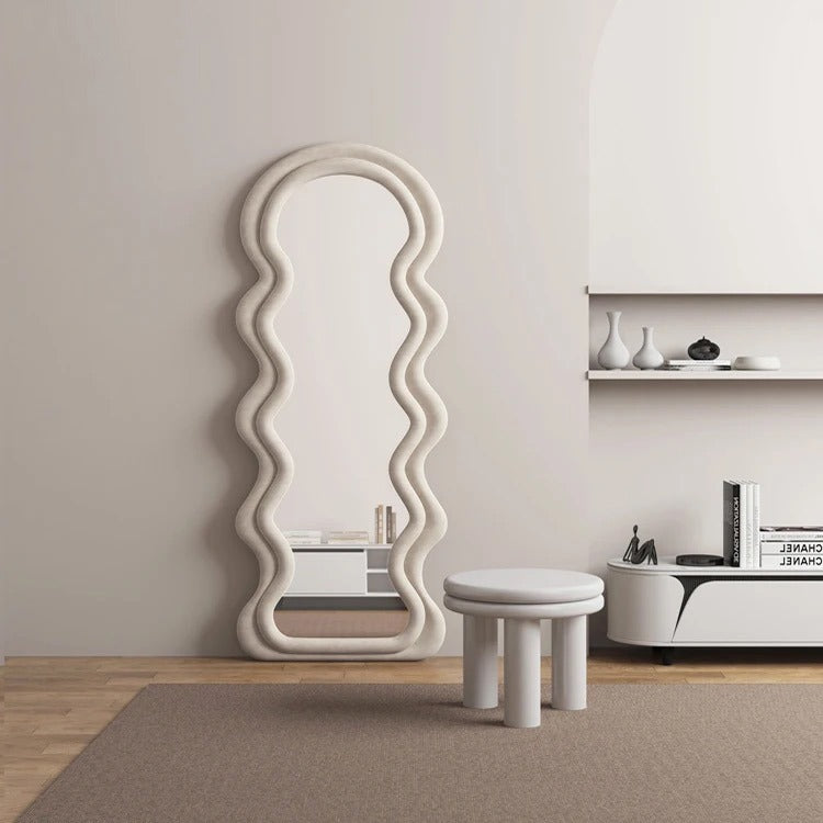 Curve shaped Full-Length Mirror placed in living room of a house