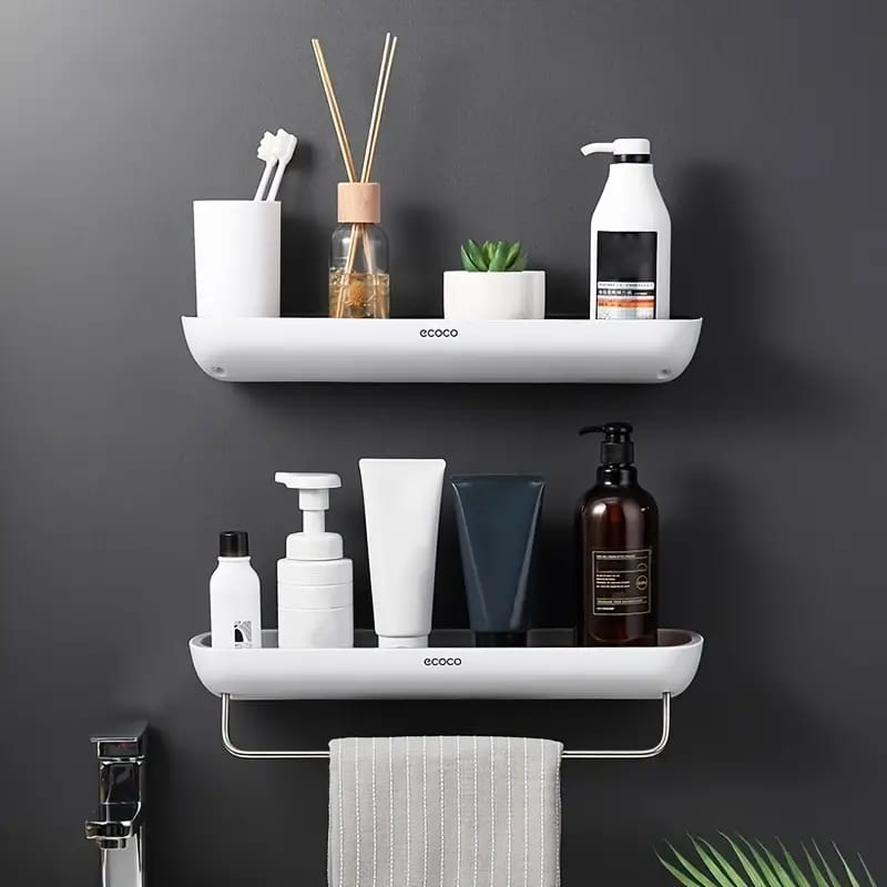 two punch-free storage rack, cleverly mounted on the wall, featuring a practical shelf for organizing essentials