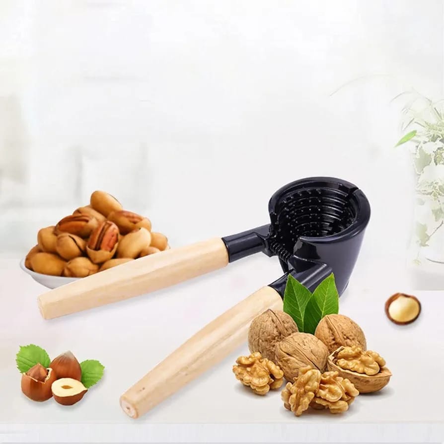 Nutcracker Tool placed near to various types of nuts cracked by the tool