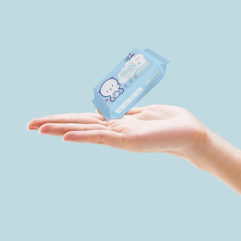 someone holding Mini Hand and Wet Wipes