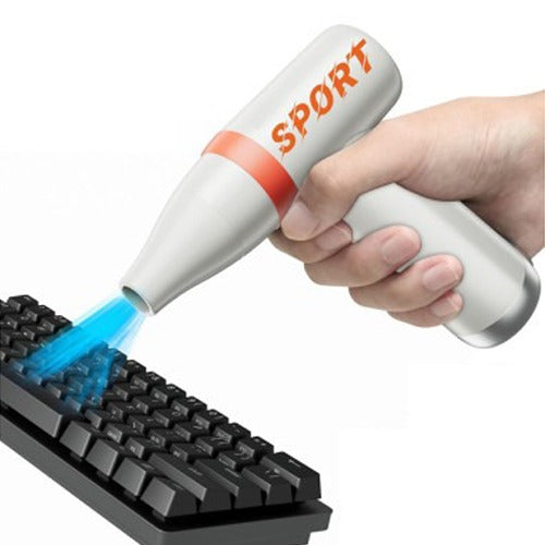 someone cleaning keyboard with One Touch High Speed Mini Fan