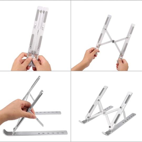 A Person is Folding Foldable Aluminum Laptop Holder Rack.