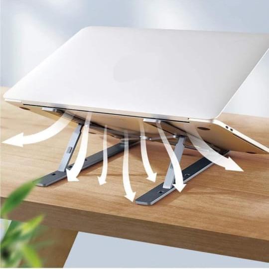 A Laptop s Placed at Foldable Aluminum Laptop Holder Rack.