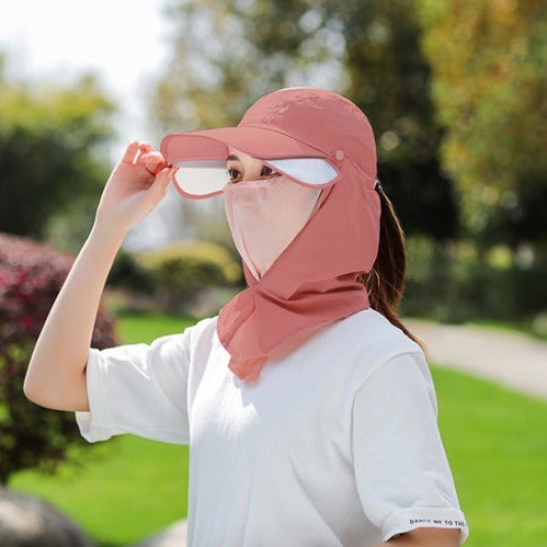 A Woman is Wearing Wide Brim Bucket Hat with Neck Cover.