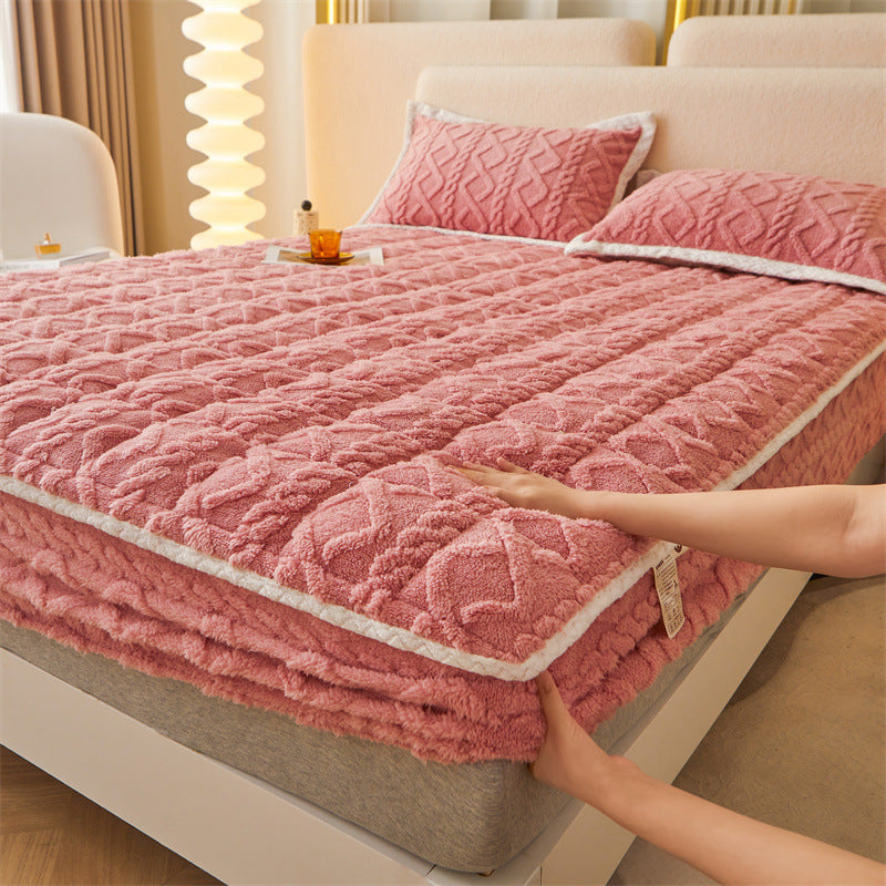 lady touching Cozy Coral Fleece Fitted Bed Sheets