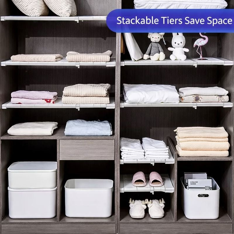 Adjustable Cabinet Shelf Divider Organizers are Installed Inside Wardrobe and Clothes are Organized in it.