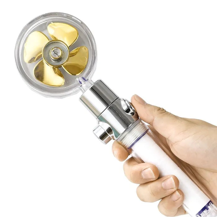 Someone is holding the Rotating Pressure Adjustable Shower Head with Water Filter