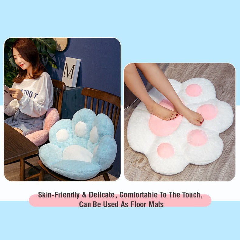 2 different image where one image shows a women reading book while sitting on cat cute paw cushion where its resting on chair and an another blue cat paw cushion beside on an another chair. The other image shows women using cat paw cushion as a floor mat
