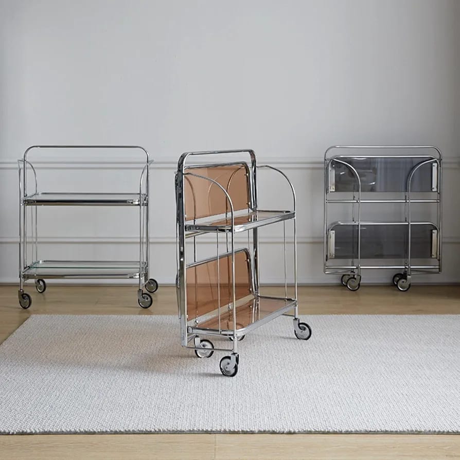 folding 2-tier serving trolley with a chrome finish, glass shelves, and rolling wheels.