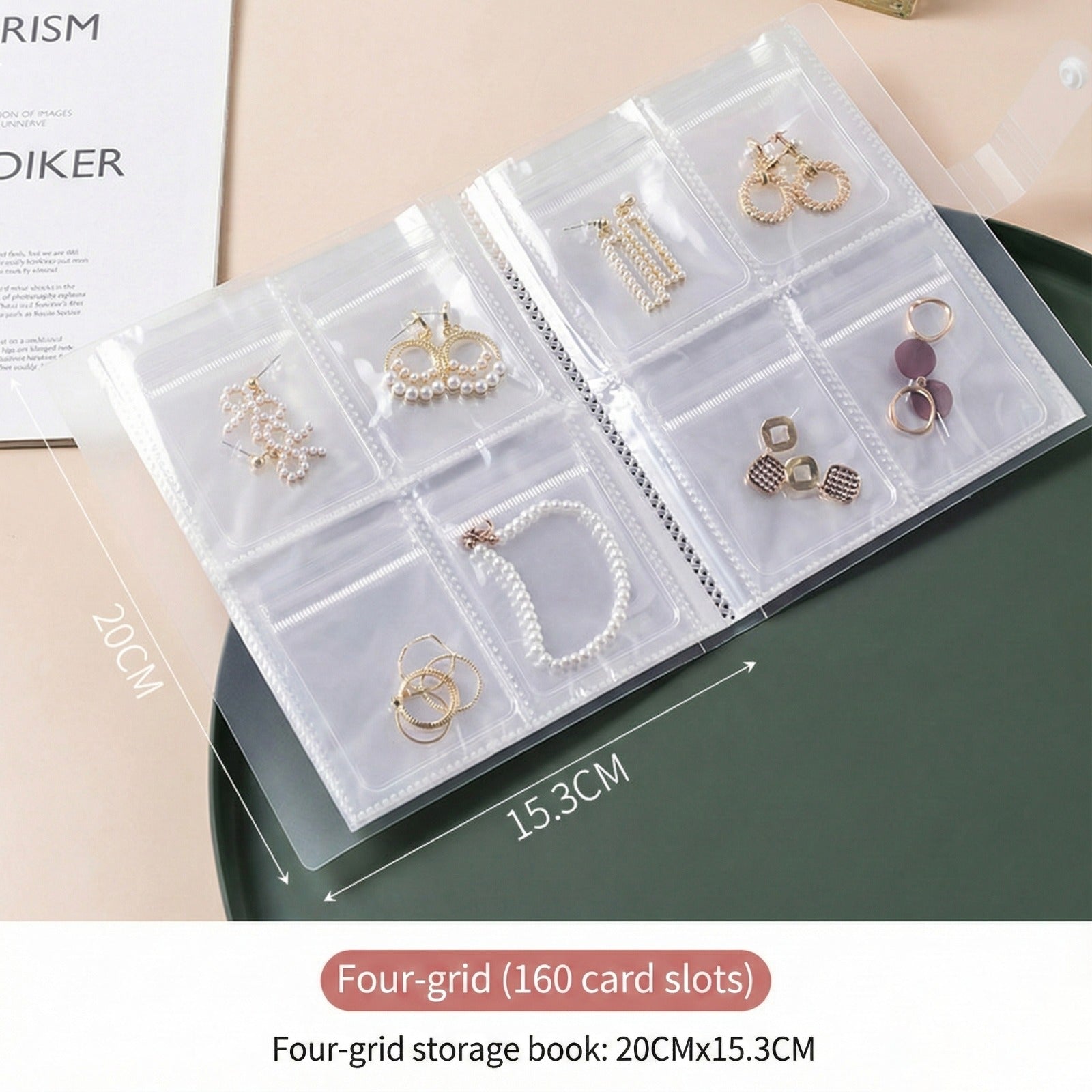 A transparent jewelry storage book with multiple clear pocket sleeves displaying neatly organized earrings, bracelets, and rings.